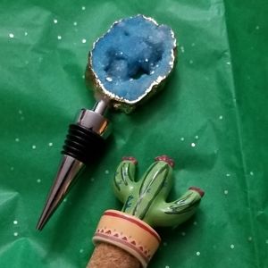 Pair of wine bottle stoppers, never used.